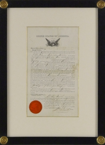naturalization document, wooden frame and gilded bevel mat